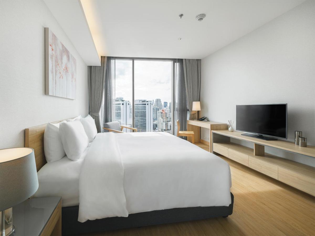 Oakwood Suites Bangkok Eksteriør bilde Deluxe Room
