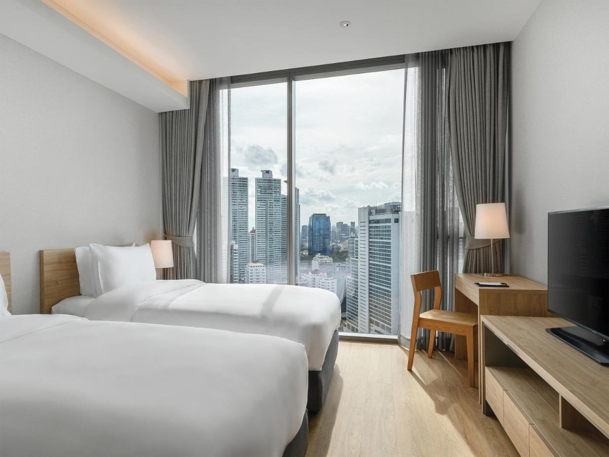 Oakwood Suites Bangkok Eksteriør bilde Deluxe Room