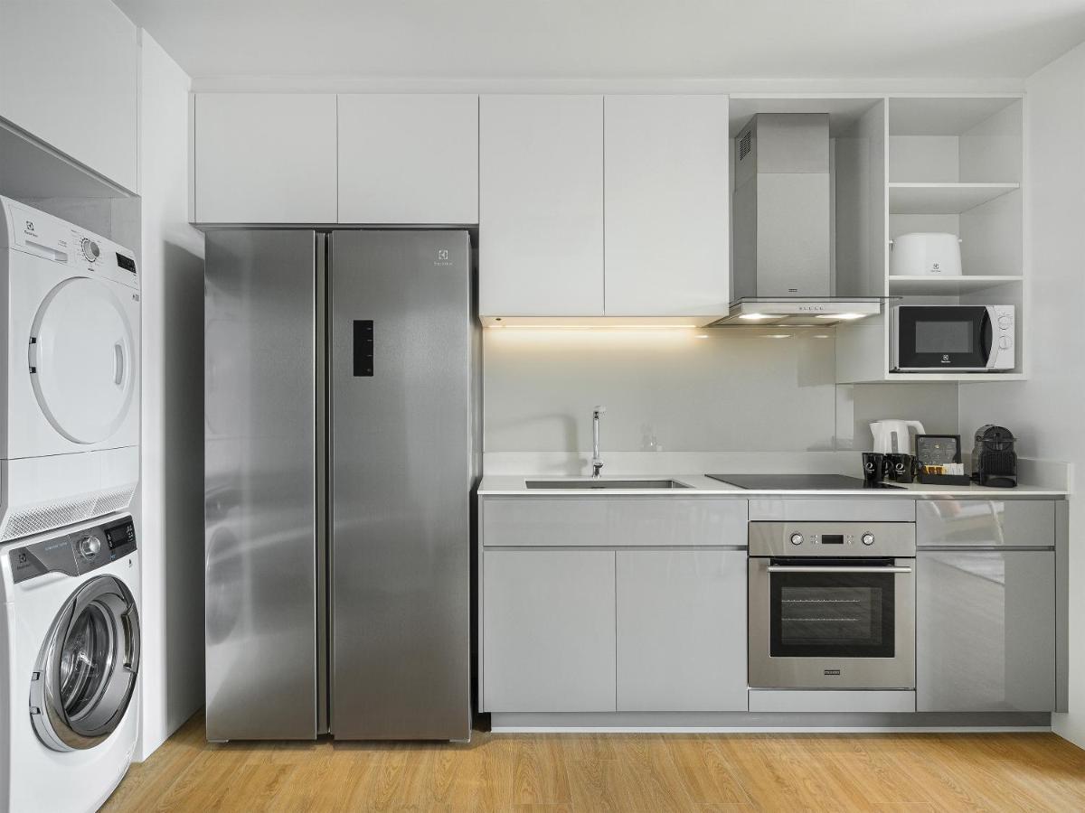 Oakwood Suites Bangkok Eksteriør bilde A modern kitchen