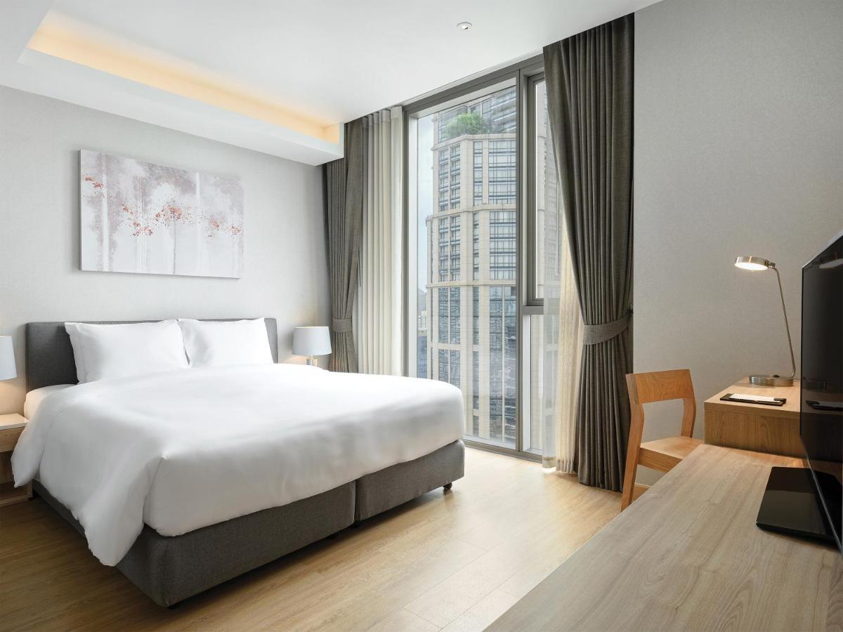 Oakwood Suites Bangkok Eksteriør bilde Deluxe Room