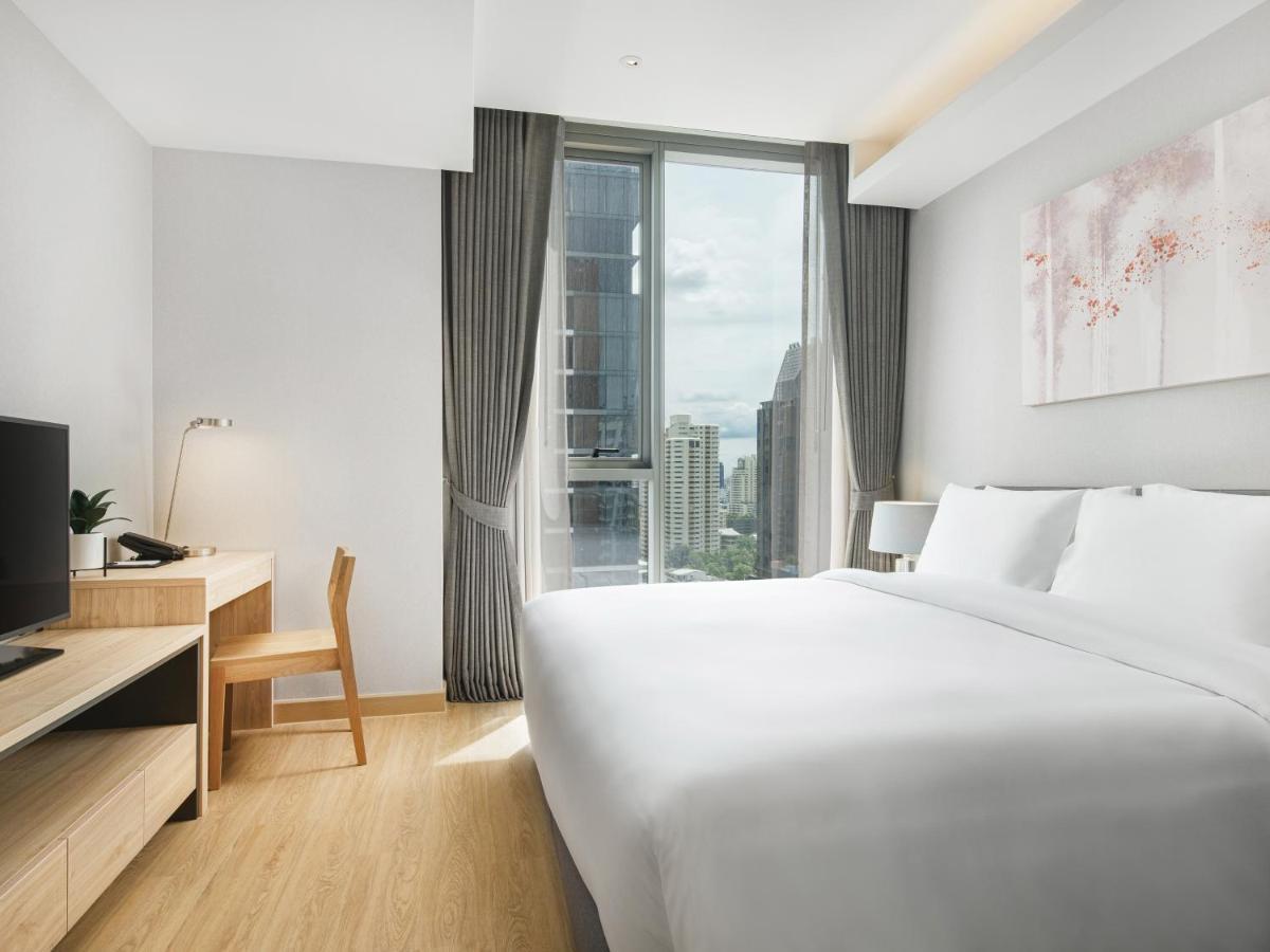 Oakwood Suites Bangkok Eksteriør bilde Deluxe Room