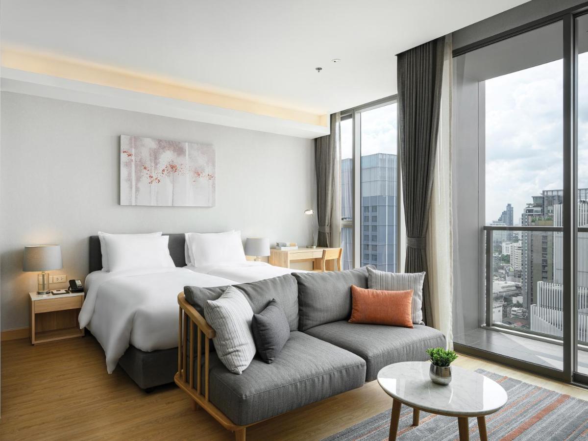 Oakwood Suites Bangkok Eksteriør bilde Deluxe Room