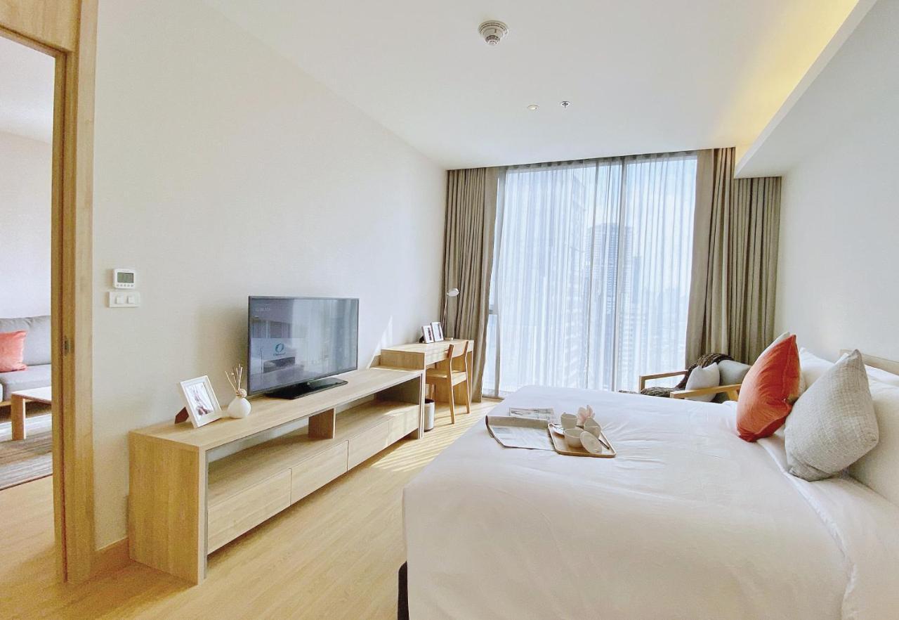 Oakwood Suites Bangkok Eksteriør bilde Deluxe Room